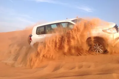 Dubai Desert Safari by Camel and 4x4 Jeep with BBQ Dinner with Live Belly Dance
