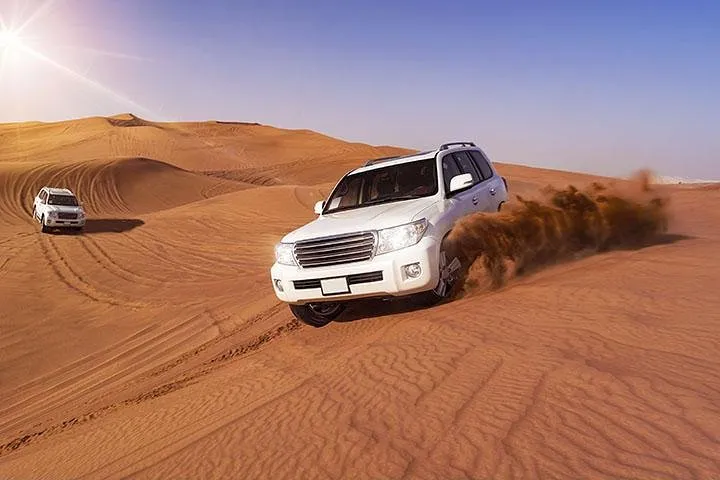 Dubai Evening Desert Safari, Camel Ride, Sandboarding & BBQ Dinner