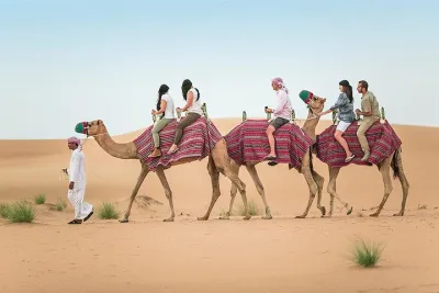 Dubai Camel Rock Desert Safari with Dune Bashing & BBQ & Show