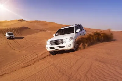 Dubai Morning Red Dunes with Camel Safari & Sandsurf