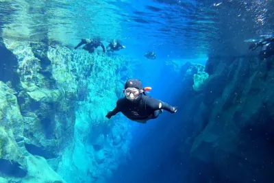 Silfra Wetsuit Snorkeling Tour with Underwater Photos - From Reykjavik