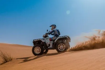 Half-Day Quad Bike Tour in Dubai Dunes with Camel Ride