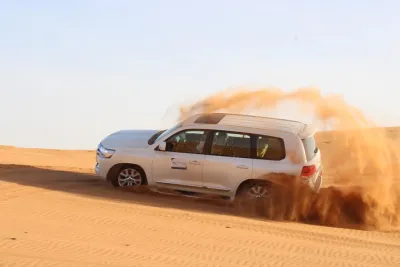 Red Dunes Desert Safari, Sand Board, Camel Ride with BBQ Dinner