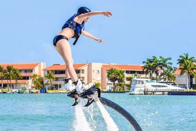 Flyboard extreme activity in Cancun with equipment and instructor
