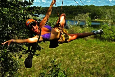 Adrenaline day driving ATV’s doing Ziplines and swimming in a Cenote from Cancun