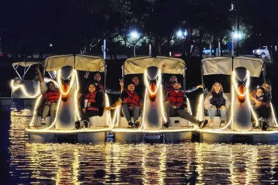Illuminated Swan Boat Night Ride on Rainbow Lagoon in Long Beach
