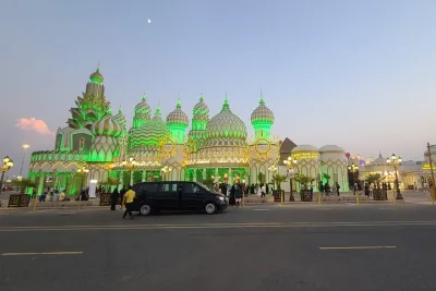 Global Village two way transfer by van in Dubai