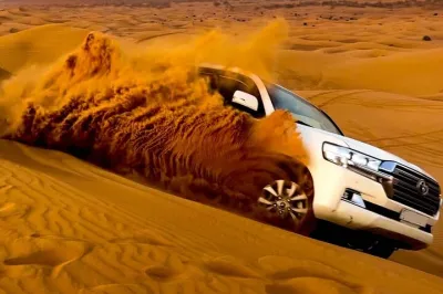 Dune Bashing, Sand Boarding & Camel Ride