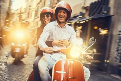 Ride Rome on a Vespa with a local driver