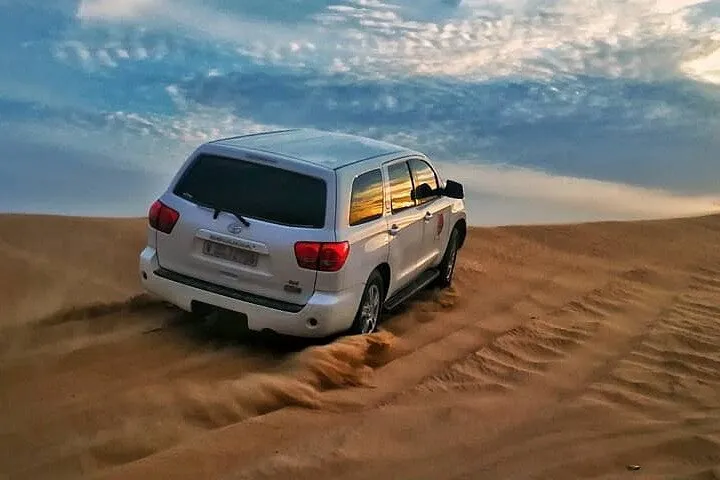 Sunset Desert Safari Dubai with Camel Ride and Sandboarding