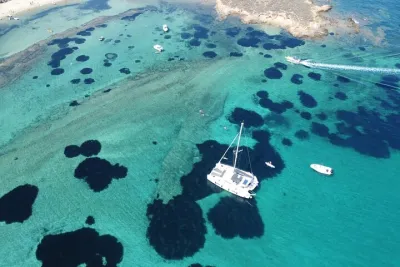 Sail the Athenian Coastline on a Catamaran with Meal & Wine