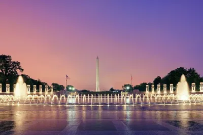 Guided Monuments & Memorials Sunset Tour by Open-top Bus