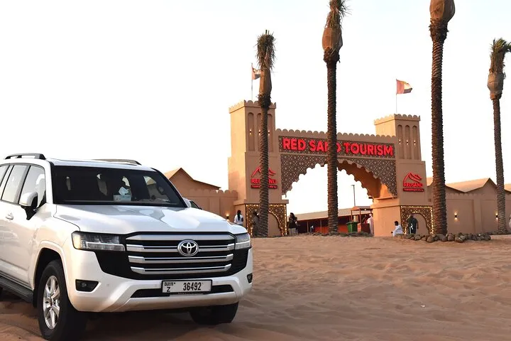 Experience the Desert Safari BBQ, Dinner Camel Ride Sandboarding