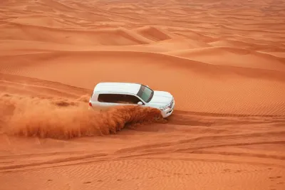 Red Dunes Morning Safari: Dune Bashing, Camel Ride & Quad Biking
