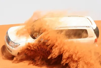 Dubai Desert Safari with BBQ Dinner, Camel Ride, and Shows