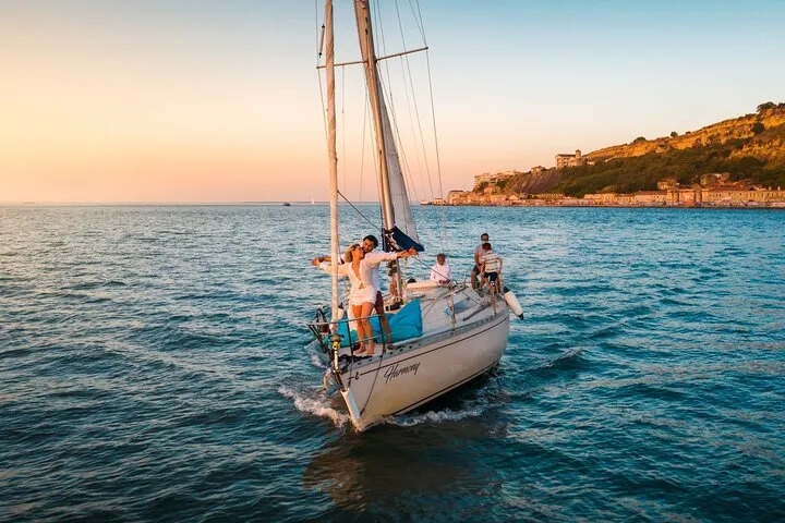 Lisbon: "Sunset" and "Day Tours" by boat, with drinks and Music.