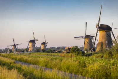 Famous Holland Tour: Visit Kinderdijk Rotterdam Delft from A'dam