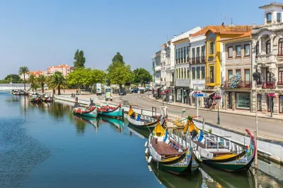 Private Aveiro and Coimbra Tour with Moliceiro Ride from Lisbon