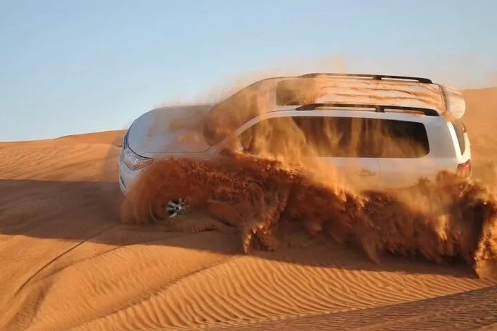 Dubai Desert Safari Dune Bashing, Camel Ride, and BBQ Dinner