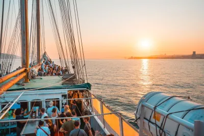 Lisbon Boat Party with Music, Drinks, and Stunning Views.