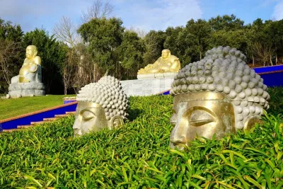 Mira Aire Caves and Porto de Mos and Buddha Eden Tour