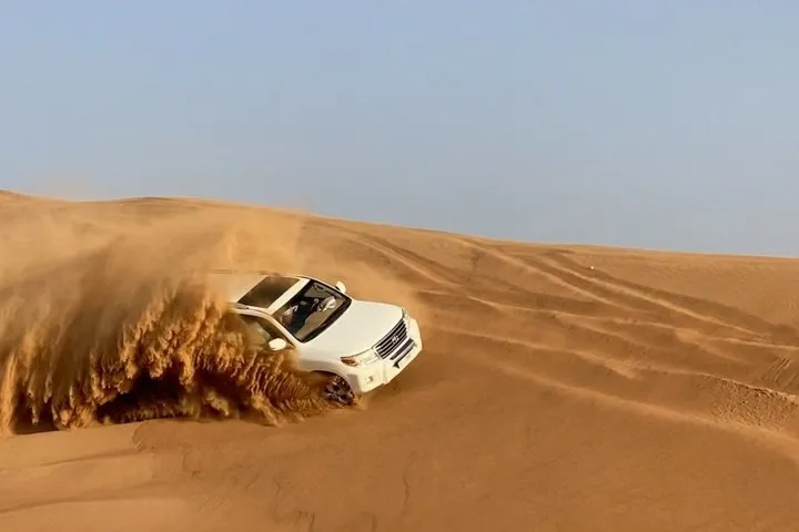 Premium Desert Safari with VIP Lounge, Quad, Camel Ride & Dinner